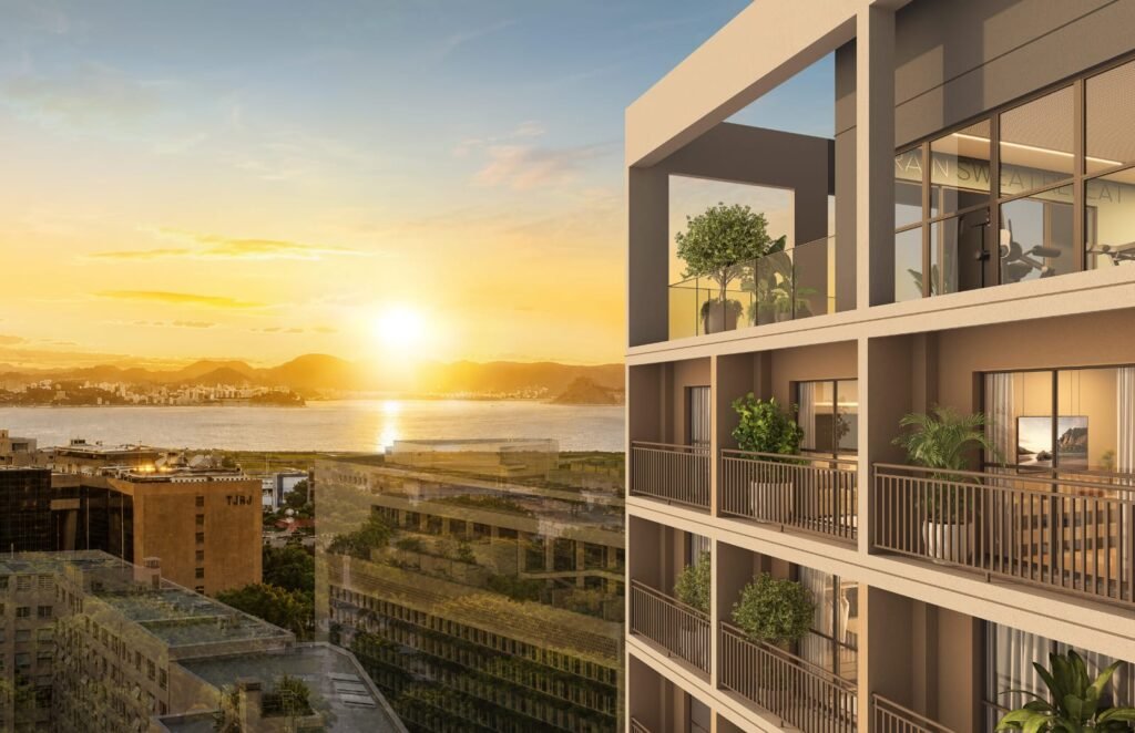 Varanda do Connect Square com vista para a Baía de Guanabara ao pôr do sol