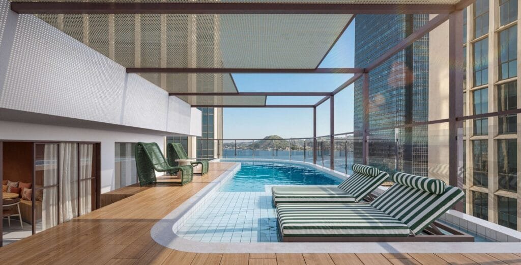 Se7e Full Week Studios — piscina no rooftop com vista para a Baía de Guanabara